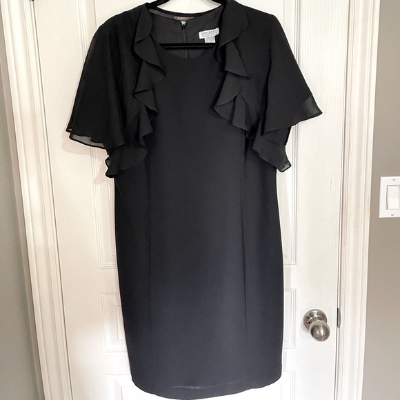 I’m selling a black dress with a black mini cover - Picture 2 of 3